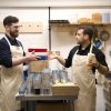 Two men making candles