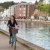 Picture of people cycling near to Exeter Quay