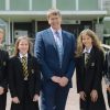 Headteacher Rupert Poole with students from Queen Elizabeth's School