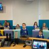 Jake (centre) talking to Sir Richard (onscreen) in the classroom