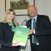 Samantha Meaden receiving her award from Dave Jenkinson, CEO of Persimmon Homes