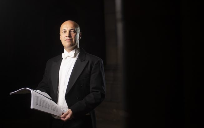 Exeter Philharmonic Choir's conductor Howard Ionascu