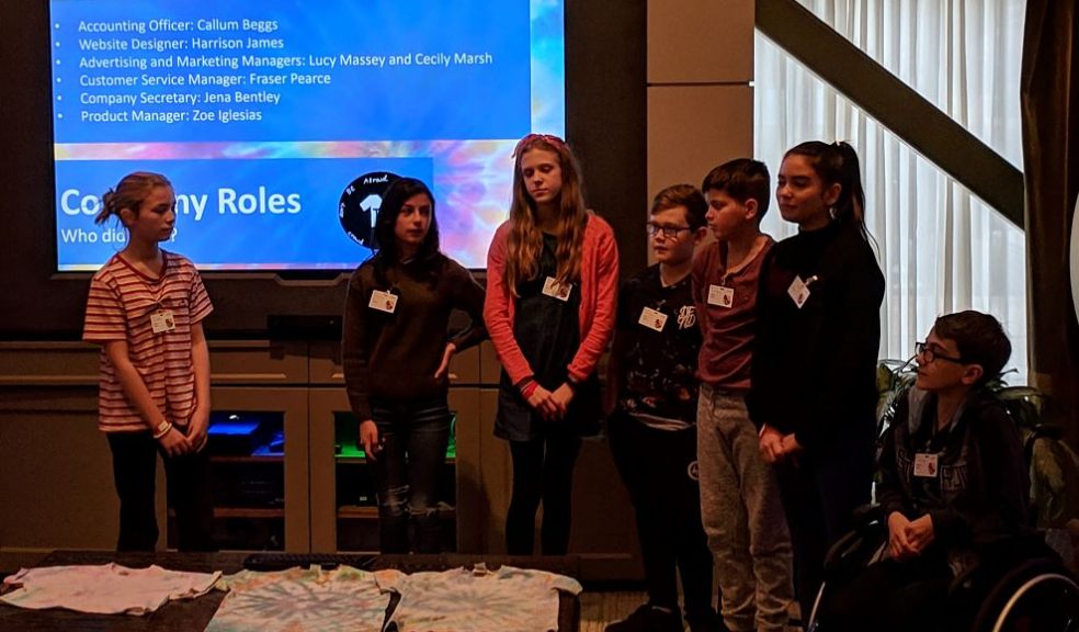 The Broadclyst team show their t-shirt samples at the presentation in Microsoft HQ, Seattle