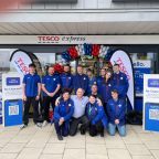 group of men and women outside Tesco supermarket in Exeter