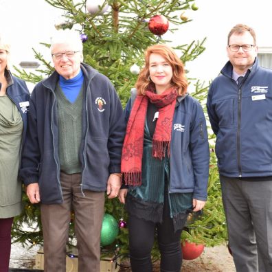 People and christmas tree