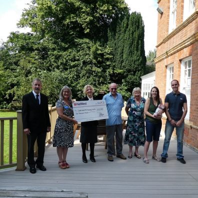 presentation of ten thousand pound cheque by east devon crematorium at south west ms centre