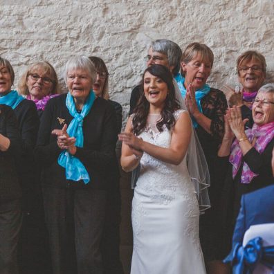 Rachel singing with the Hospiscare Choir at her wedding