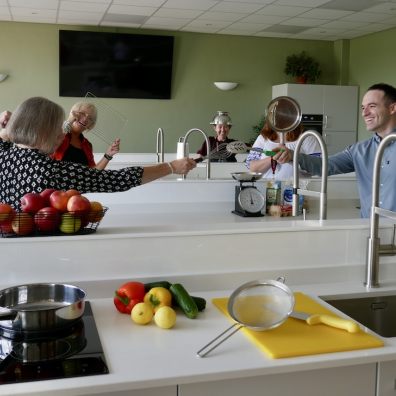 Some of the Westbank team getting creative in the new Community Cookery School 