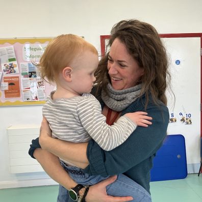 Westbank's Kidzone Childcare Manager Lucy Elliott with one of the toddlers